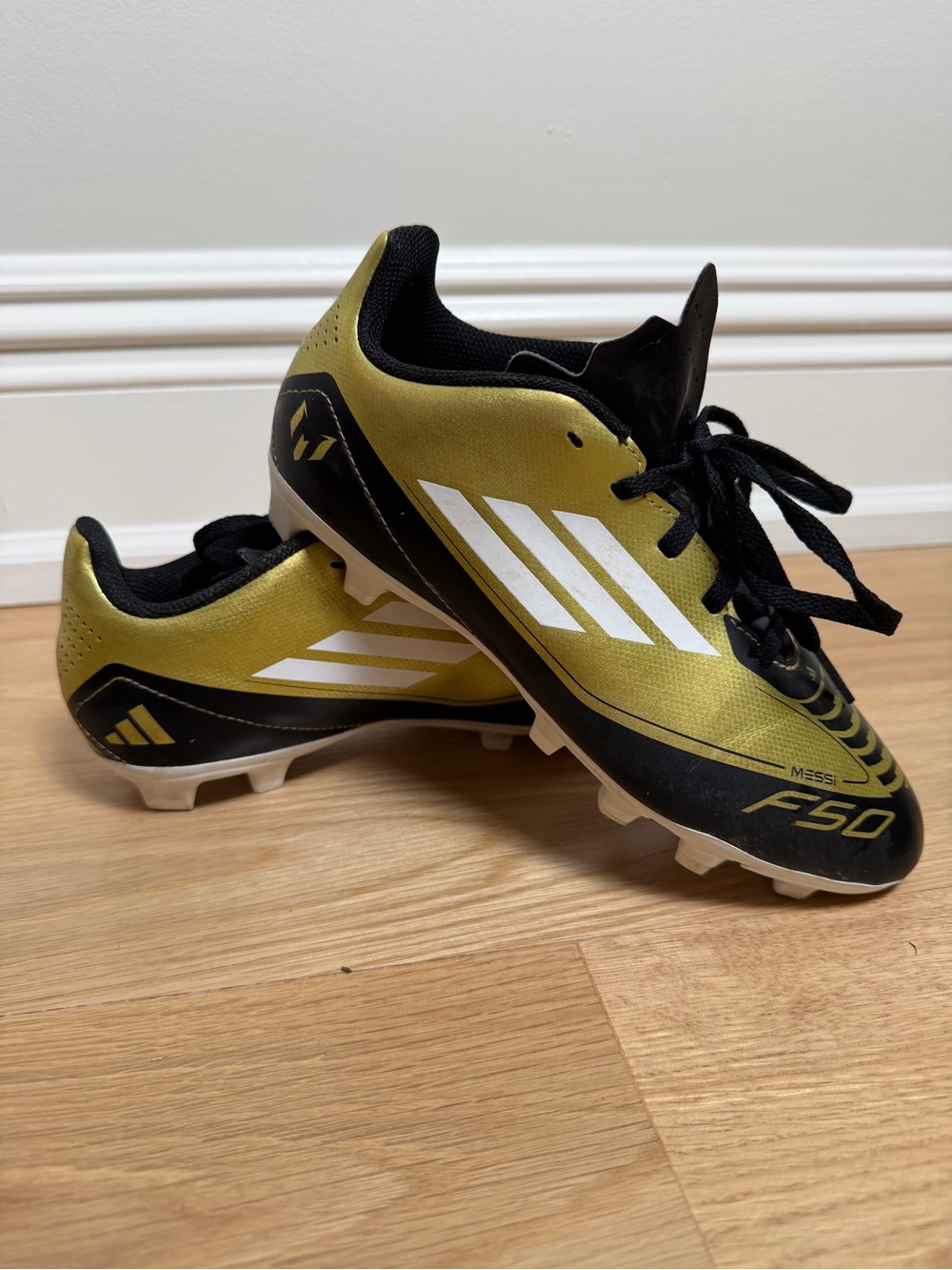 adidas US Kids Size 4 Gold & Black F50 Cleats with White Stripes